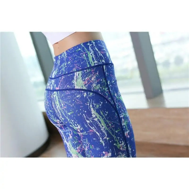 Paint Splatter 90s Yoga Pants with vibrant retro design and high waist for comfort.