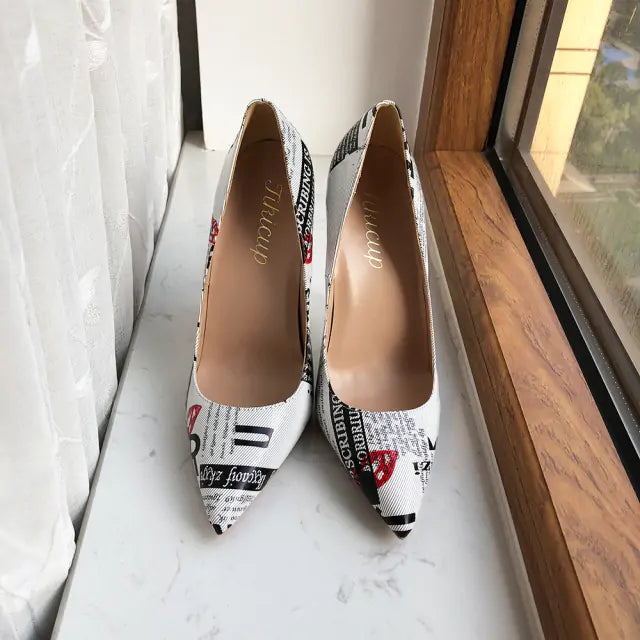 Zapatos de tacón alto con punta puntiaguda