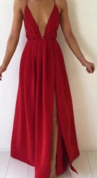 Red Natalia Dress with a flowing silhouette and deep V-neckline.