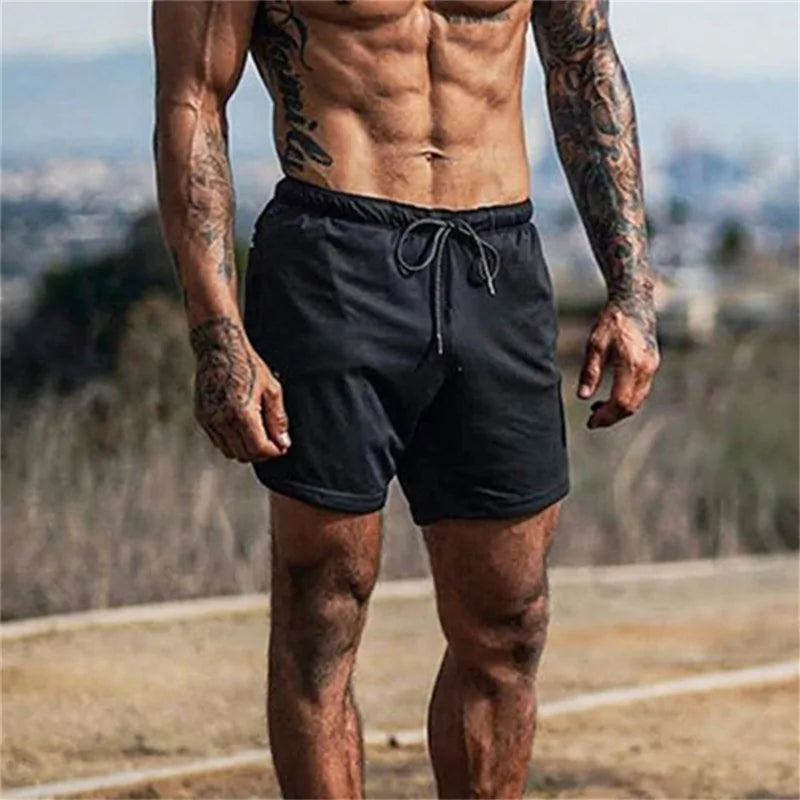 Pantalones cortos de fitness para hombre: pantalones cortos deportivos de malla transpirable y secado rápido