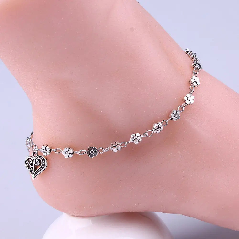 Tobillera con cadena de cuentas de plata