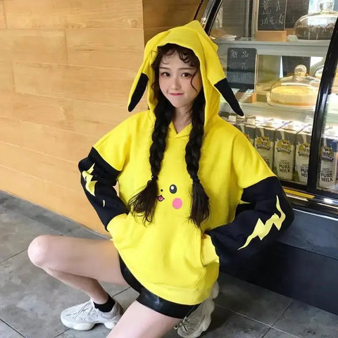 Cute Anime Pikachu Sweatshirt Hoodie featuring bright yellow color, black sleeves with lightning bolt design, and iconic Pikachu face.