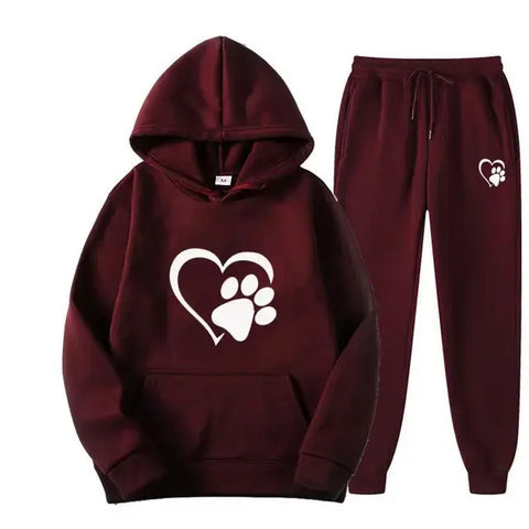Dog print hoodie and pants set in dark red with paw and heart design.